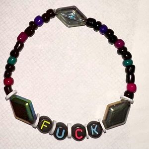 stretchy handmade friendship bracelet with glass and iridescent beads “fxck”